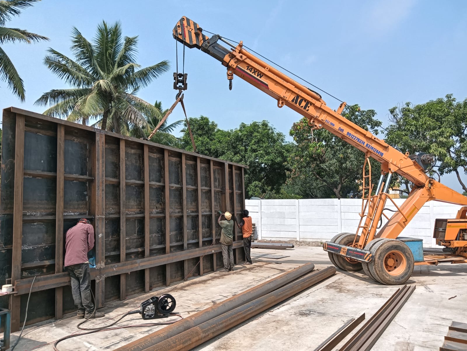 Heavy steel structure fabrication with crane at fabrication site