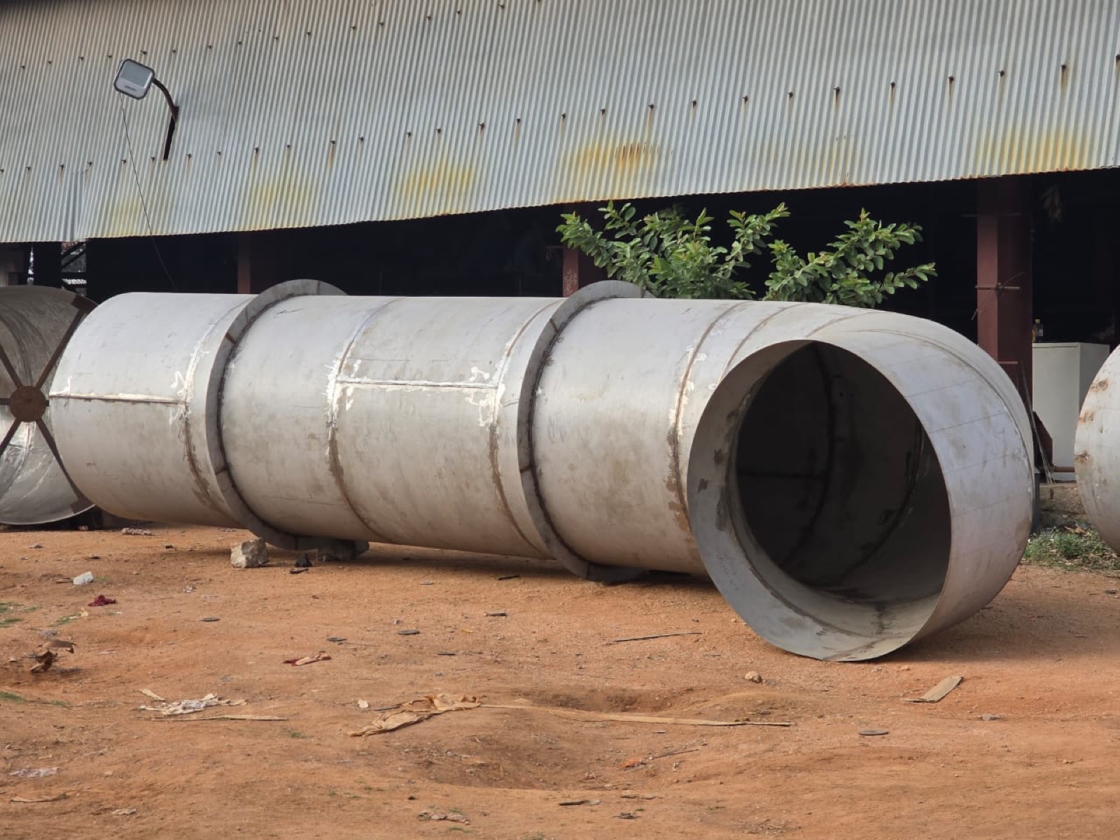 Fabricated industrial cylinder and duct at fabrication yard